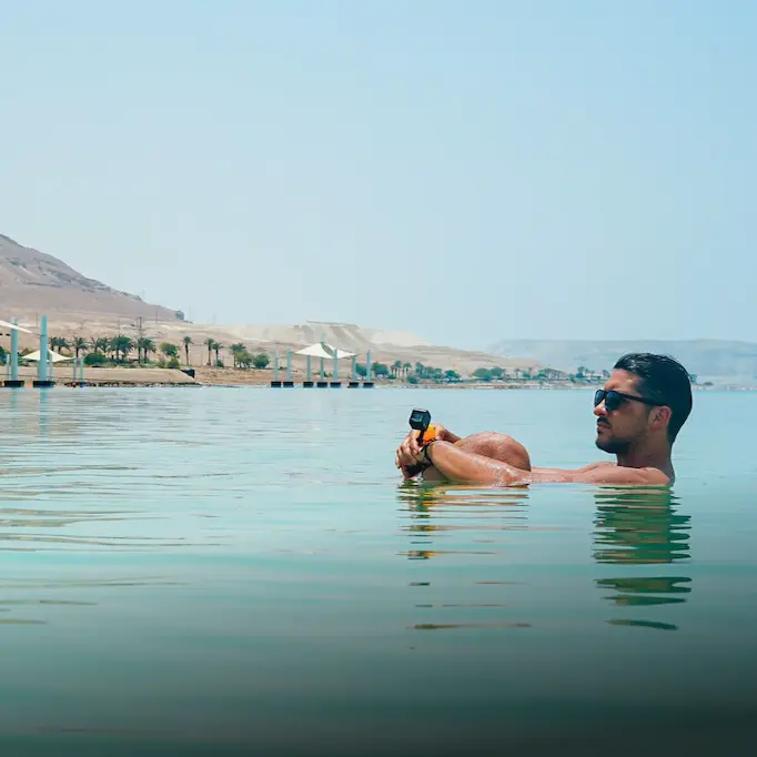 Man floating in the Dead Sea, Israel