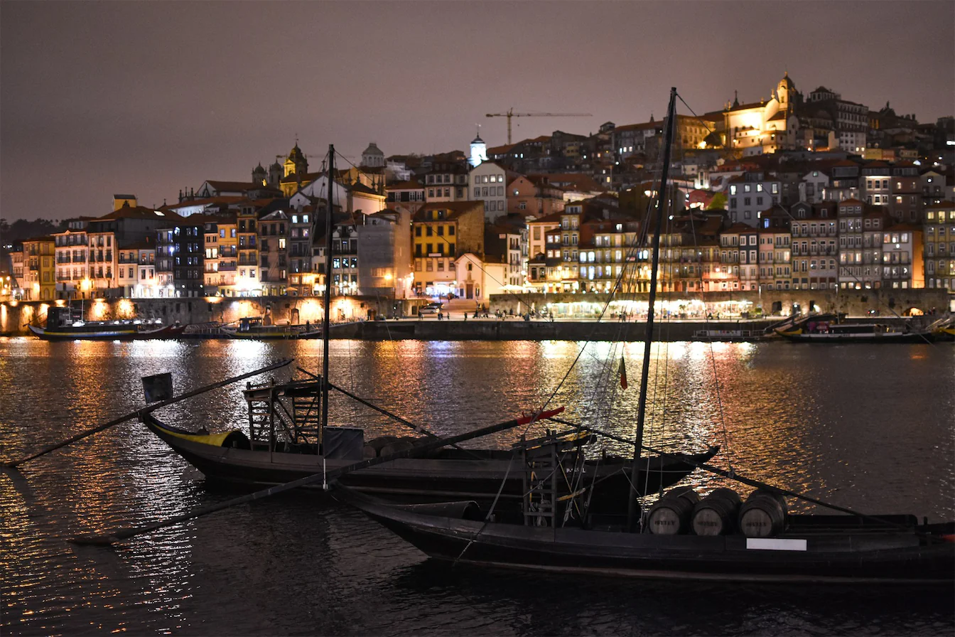 Lisbon's riverfront illuminated at night
